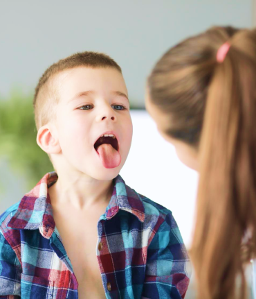 child with tongue photo